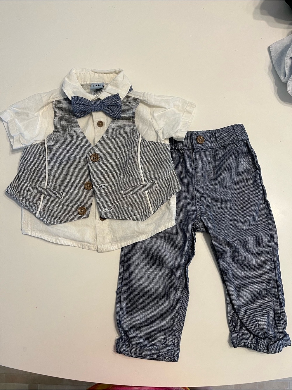 Formal vest and bowtie outfit